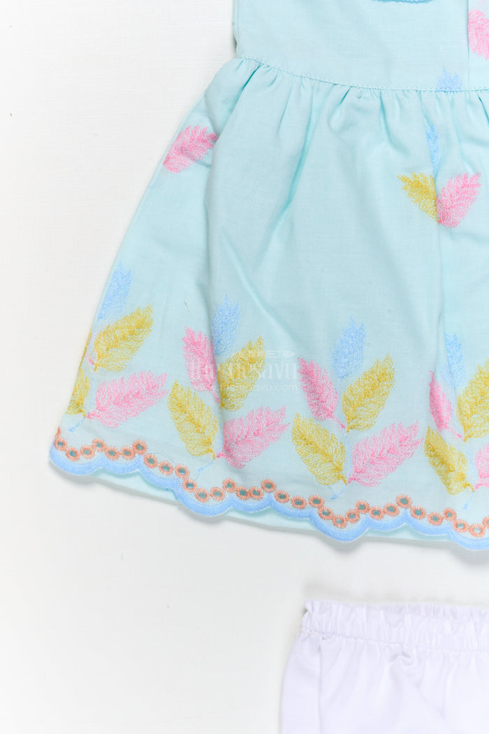 The Nesavu Baby Cotton Frocks Embroidered Baby Frock and Bloomer Set with Playful Leaf Detailing Nesavu Baby frock and bloomer set with multicolor leaf embroidery and character motif