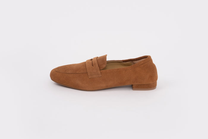 Large sized womens Brown suede loafer shoe on a white background