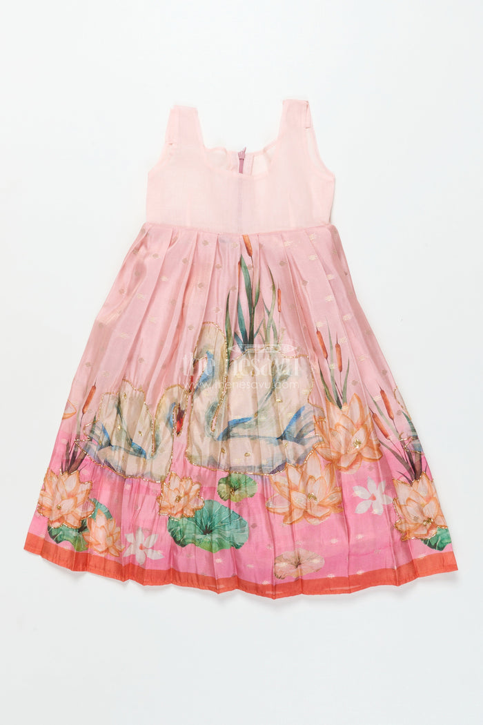 The Nesavu Pattu Pavadai Toddler Girl Pattu Pavadai with Floral Skirt and Semi Banaras Yoke Nesavu Nesavu toddler girl pink floral pattu pavadai with semi Banaras blouse for traditional occasions