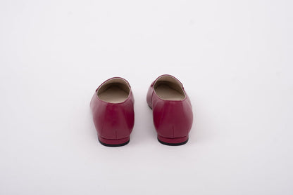 Back shot of womens large sizes flat purple shoe available in sizes 8-12