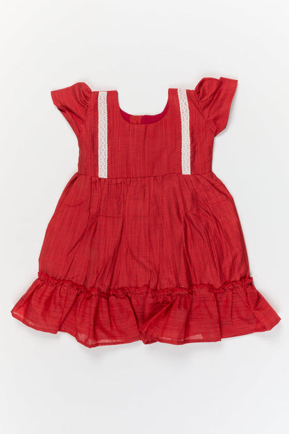 The Nesavu Girls Chanderi Frock Baby Girl Chanderi Frock with Lace Detailing for Casual Festive Moments Nesavu 10 (NB) / Red / Chanderi GFC2095A-10 Nesavu baby girl chanderi cotton frock with lace and ruffle hem for festive and everyday wear