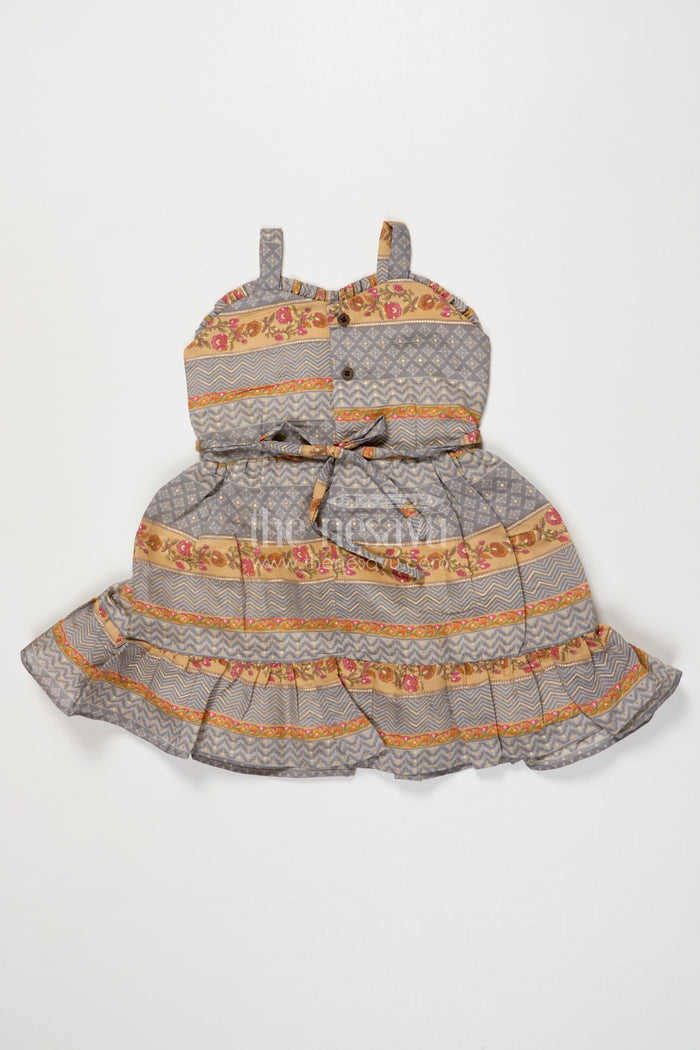 The Nesavu Girls Cotton Frock Baby Girl Ethnic Frock with Shoulder Straps and Festive Print for Special Occasions Nesavu Nesavu baby girl ethnic printed frock with straps and flared layers for festive moments