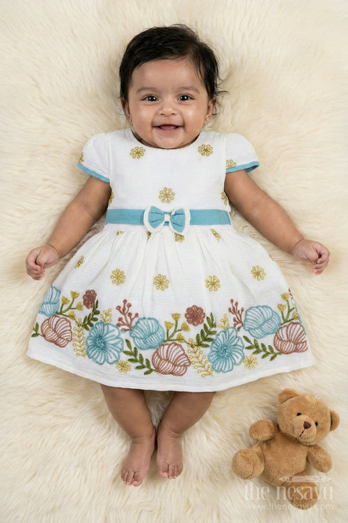 The Nesavu Girls Cotton Frock Baby Girl Frock with Thread Embroidery for Festive Daywear Nesavu 14 (6M) / White / Cotton BFJ919B-14 Nesavu baby girl cotton frock with full floral thread embroidery and comfort fit