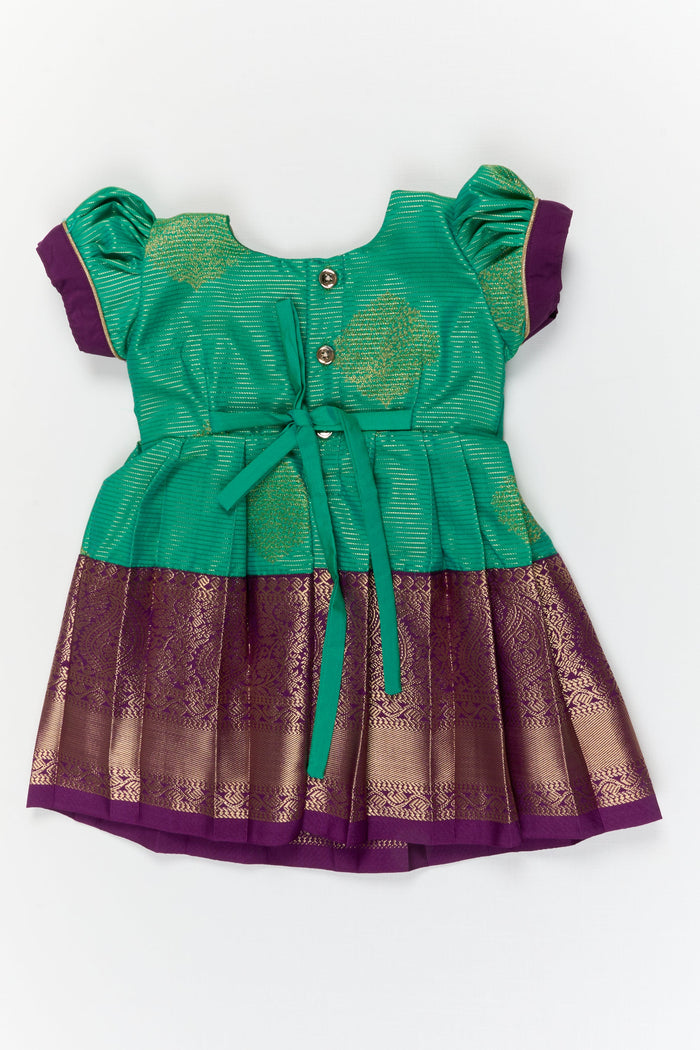 The Nesavu Girls Kanchi Silk Frock Baby Girl Kanchipuram Silk Frock for Weddings and Traditional Photoshoots Nesavu Nesavu baby girl kanchipuram silk frock with zari border for weddings and traditional functions