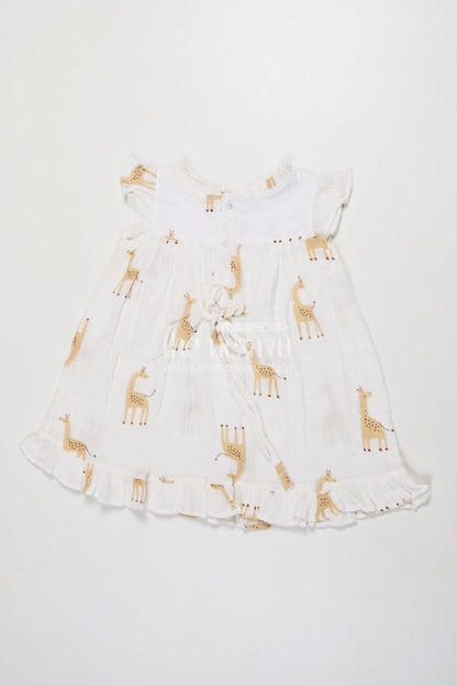 The Nesavu Girls Cotton Frock Baby Girl Muslin Cotton Frock with Giraffe Print for Casual Outings and Playdates Nesavu Nesavu baby girl muslin cotton frock with giraffe print for everyday wear and outings