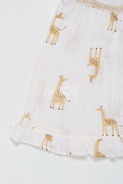 The Nesavu Girls Cotton Frock Baby Girl Muslin Cotton Frock with Giraffe Print for Casual Outings and Playdates Nesavu Nesavu baby girl muslin cotton frock with giraffe print for everyday wear and outings