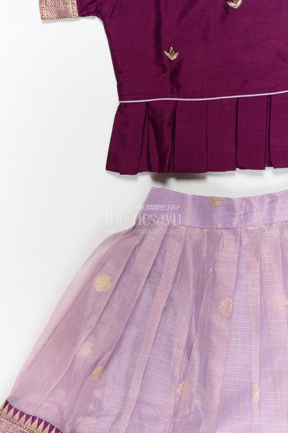 The Nesavu Pattu Pavadai Baby Girl Pattu Pavadai for Temple Visits and Traditional Festivals Nesavu Nesavu baby girl pattu pavadai with zari border and embroidered blouse for temple and festive occasions