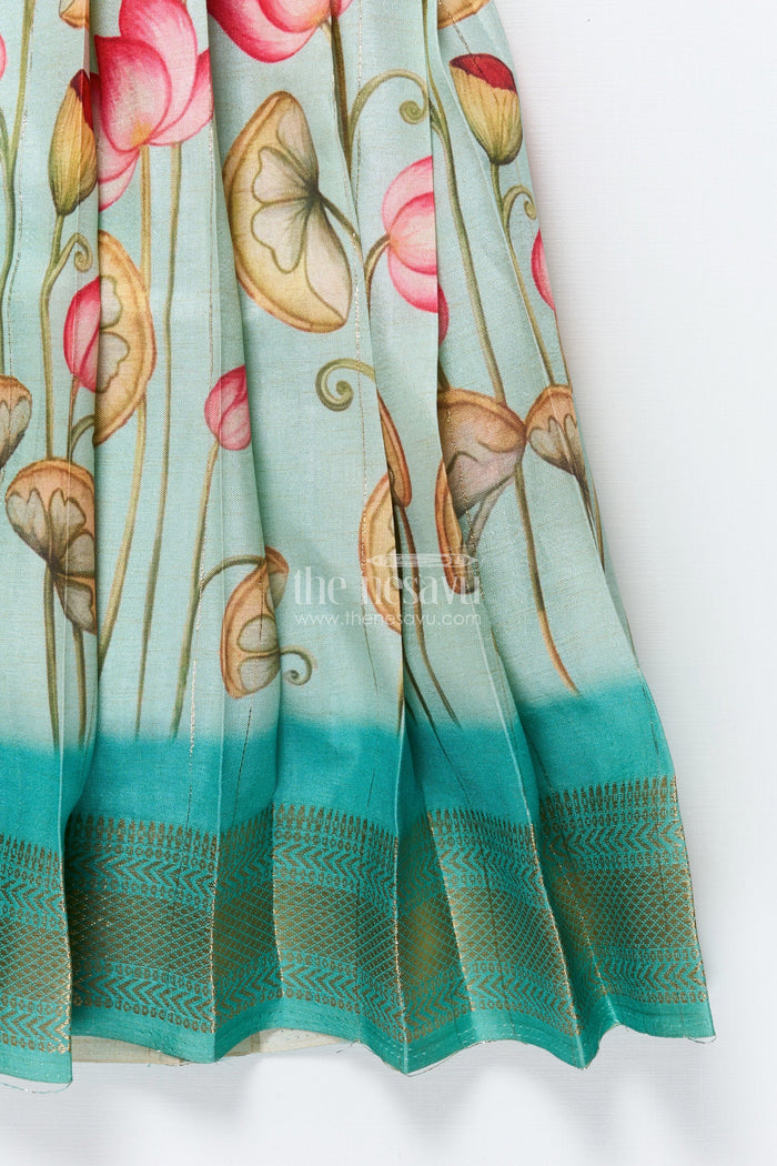 The Nesavu Pattu Pavadai Baby Girl Pattu Pavadai with Floral Skirt and Elephant-embroidered Blouse Nesavu Nesavu baby girl pattu pavadai with lotus print skirt and embroidered elephant blouse