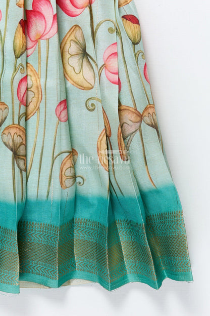 The Nesavu Pattu Pavadai Baby Girl Pattu Pavadai with Floral Skirt and Elephant-embroidered Blouse Nesavu Nesavu baby girl pattu pavadai with lotus print skirt and embroidered elephant blouse