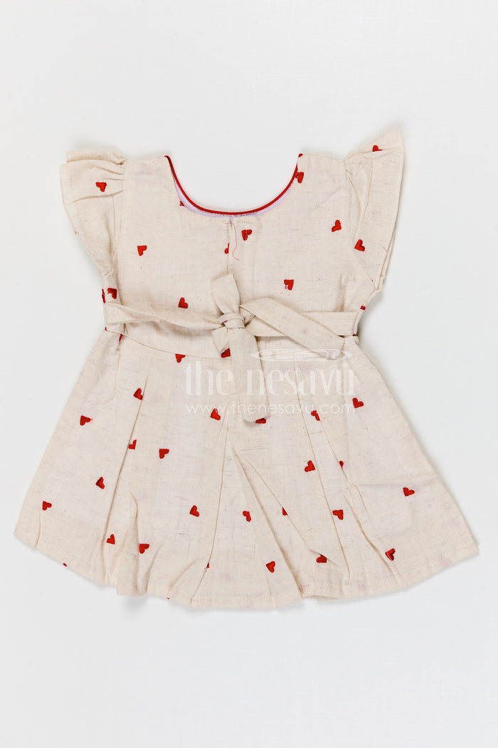 The Nesavu Baby Cotton Frocks Baby Girls Cotton Embroidered Frock with Heart Motifs and Bow Detail Nesavu Nesavu baby girls cotton embroidered frock with heart design for cute everyday wear