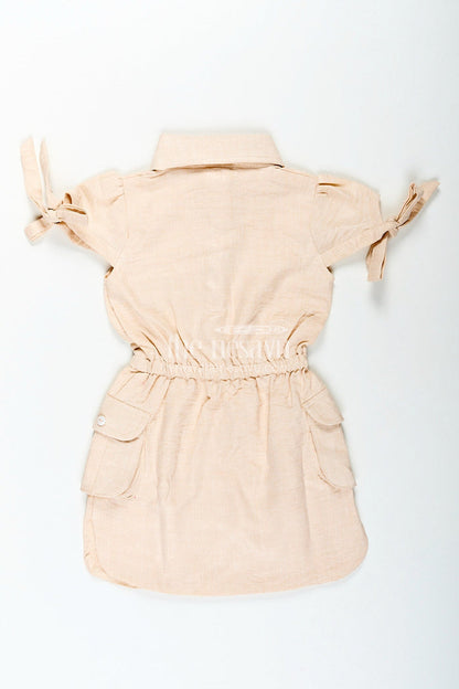 The Nesavu Girls Cotton Frock Beige girls cotton frock with collar and crochet flower patch Nesavu Nesavu beige girls cotton frock with collar and hand-crochet flower patch