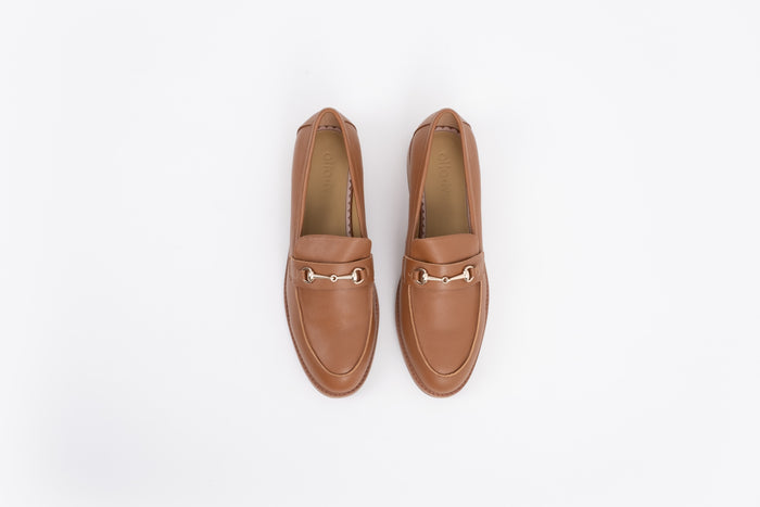 Aerial shot of womens tan leather flat shoe available in sizes 8-12, standard and wide fit