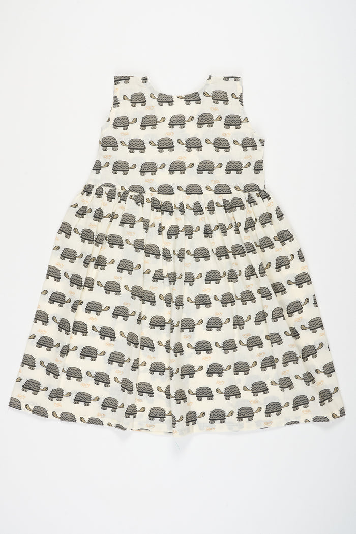The Nesavu Baby Cotton Frocks Black and White Cotton Baby Frock with Tortoise Print Simple and Stylish Everyday Wear Nesavu Nesavu Black White Cotton Baby Frock Tortoise Print Stylish Comfortable Everyday Outfit