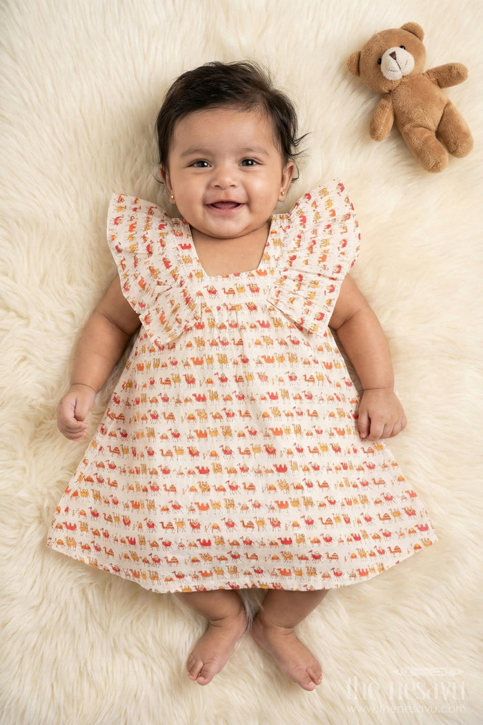 The Nesavu Baby Cotton Frocks Blue Camel Print Cotton Baby Frock with Ruffles for Newborns Nesavu 10 (NB) / Cream BFJ559B-10 Blue Camel Print Cotton Baby Frock with Ruffles for Newborns Nesavu