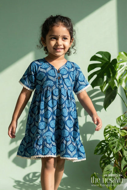 The Nesavu Girls Cotton Frock Blue Cotton Frock for Baby Girls with Wave Print and Flared Silhouette Nesavu 16 (1Y) / Blue GFC2059A-16 Nesavu blue cotton frock for baby girls with wave print and flared sleeves – summer-ready look