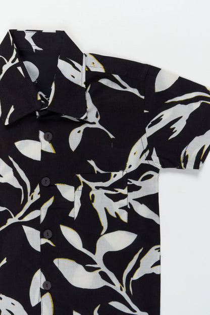 The Nesavu Boys Cotton Shirt Boys Leaf Print Cotton Shirt for Travel and Everyday Casuals Nesavu Nesavu boys cotton shirt with bold leaf print for holidays, travel and everyday wear