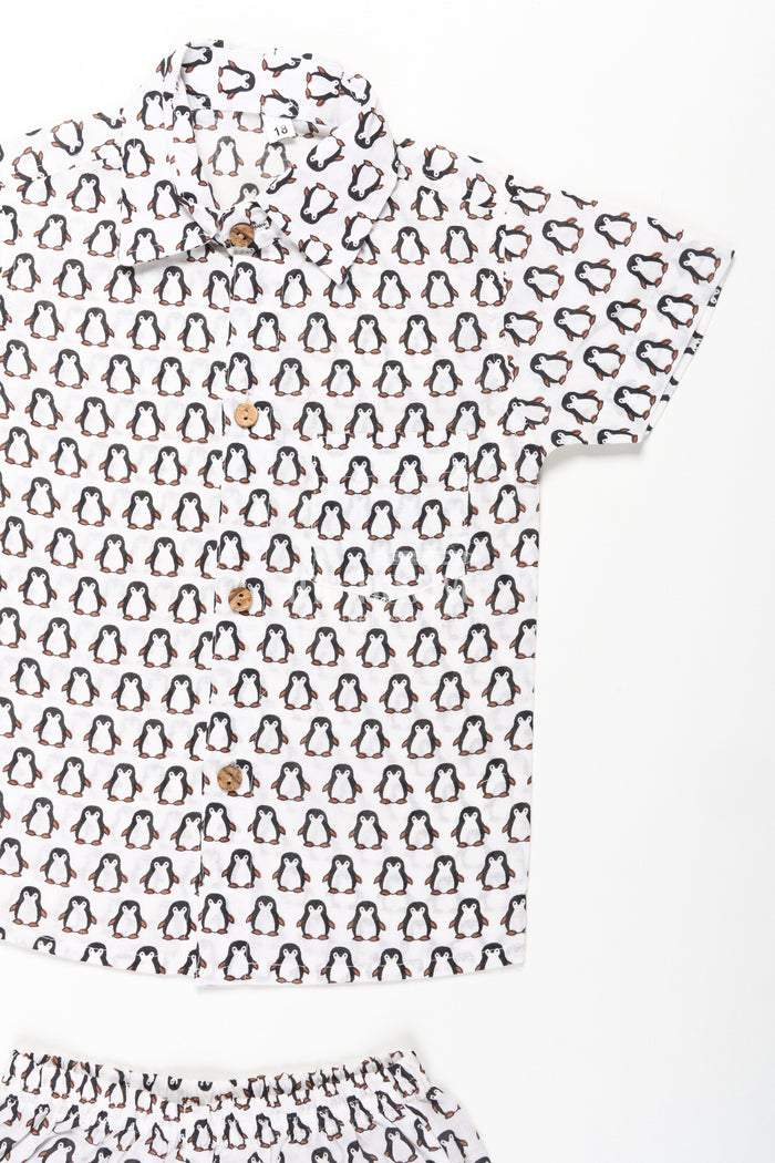 The Nesavu Boys Casual Set Boys Smart and Casual Wear Set with Penguin Print Shirt and Matching Shorts in Cool Cotton Fabric Nesavu Nesavu Boys Smart Casual Wear Cotton Set All-Over Penguin Print Shirt Shorts