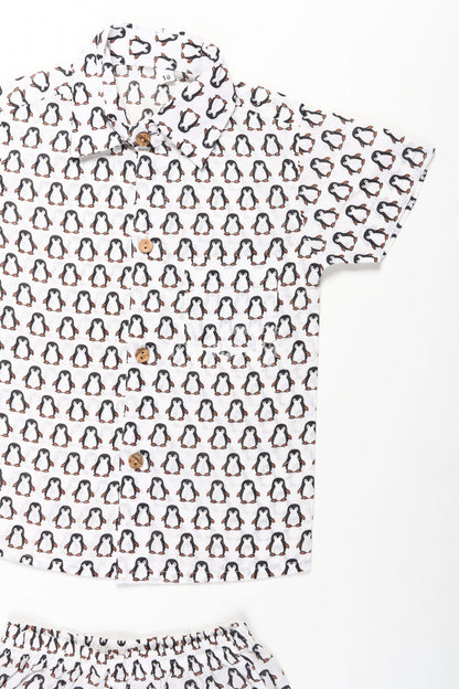 The Nesavu Boys Casual Set Boys Smart and Casual Wear Set with Penguin Print Shirt and Matching Shorts in Cool Cotton Fabric Nesavu Nesavu Boys Smart Casual Wear Cotton Set All-Over Penguin Print Shirt Shorts