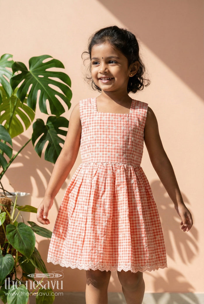 The Nesavu Girls Cotton Frock Checked Cotton Frock for Girls with Delicate Floral Embroidery and Lace Hem Nesavu 18 (2Y) / Peach / style 1 GFC2080BA-18 Nesavu cotton gingham frock for girls with chikankari embroidery and lace hemline