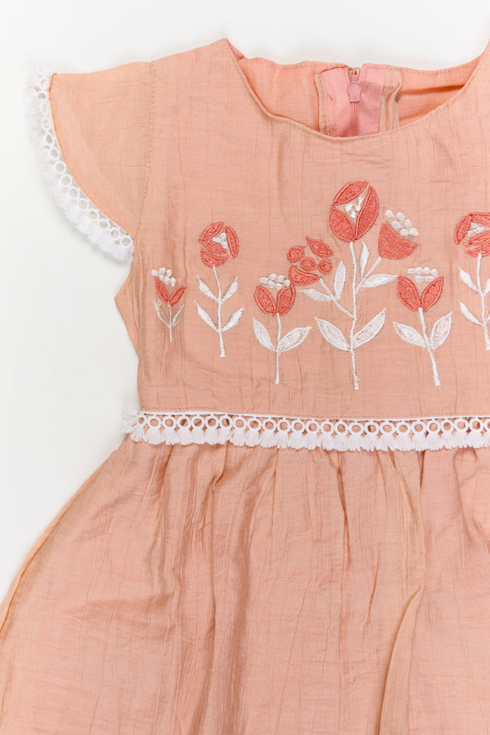 The Nesavu Girls Cotton Frock Cotton-blend Embroidered Frock with Flutter Sleeves and Floral Yoke Nesavu Nesavu cotton blend embroidered frock for festive and casual occasions