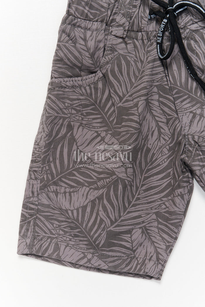 The Nesavu Boys Shorts Cotton Boys Shorts with All-over Tropical Leaf Print and Relaxed Fit Nesavu Boys casual printed shorts with leaf design and drawstring waist