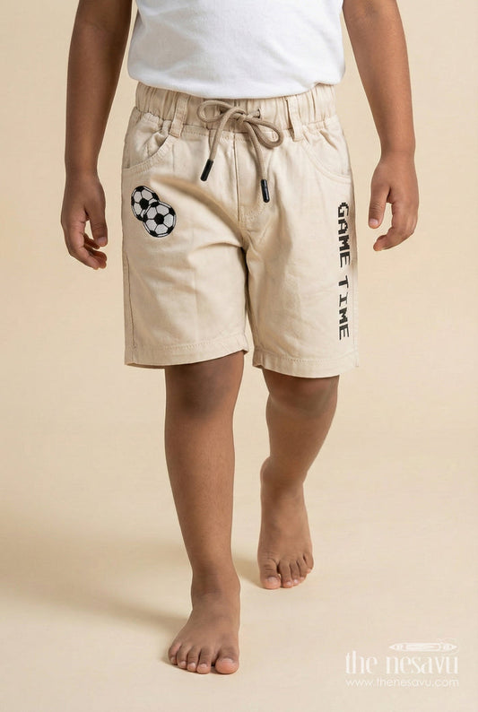 The Nesavu Boys Shorts Cotton Boys Shorts with Sporty Football Patch and Game Time Print Nesavu 14 (6M) / Cream / Cotton BWS068A-14 Boys cotton shorts with football patch and GAME TIME text for sporty kids