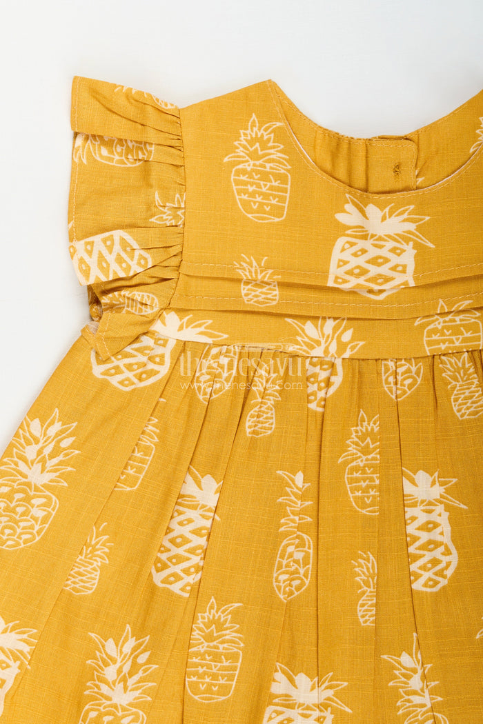 The Nesavu Girls Cotton Frock Cotton Frock for Baby Girls with Fruit Print for Everyday Wear and Outings Nesavu Nesavu baby girl cotton frock pineapple print  ideal daycare everyday comfort