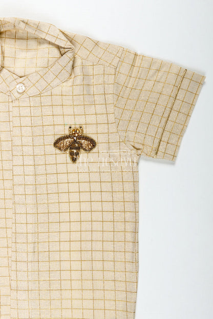The Nesavu Boys Silk Shirt Cream Colour Shirt Boys with Gold Embroidered Bee Motif and Subtle Check Pattern in Silk Blend Fabric Nesavu Nesavu Cream Colour Shirt Boys Gold Check Pattern Embroidered Bee Motif Silk Blend