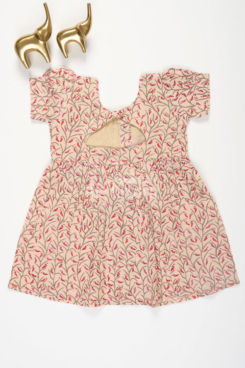 The Nesavu Baby Cotton Frocks Cream Gond Art Print Cotton Baby Frock for Girls with Button Fastening Nesavu Cream Gond Art Print Cotton Baby Frock for Girls with Button Fastening Nesavu