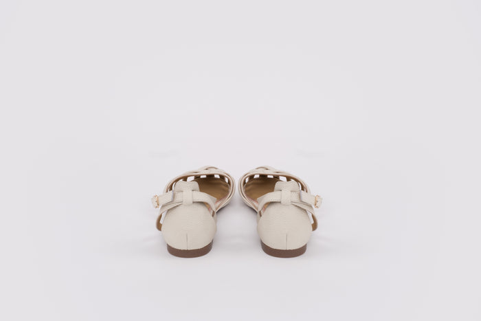 large sized womens Pair of white sandals with brown soles on a light gray background