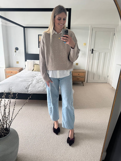 tall woman wearing berry velvet slingback heels in larger sizes 8-12