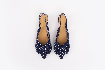Aerial shot of womens navy polka dot bow slingback kitten teen in larger sizes 8-12