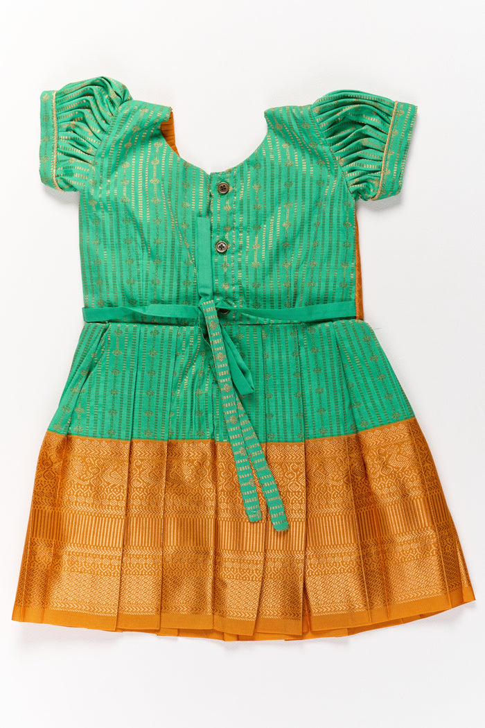 The Nesavu Girls Kanchi Silk Frock Elegant Green and Gold Pattu Full Frock for Girls with Traditional Zari Weaving Nesavu Nesavu Elegant Green Gold Pattu Full Frock Girls Traditional Zari Weaving