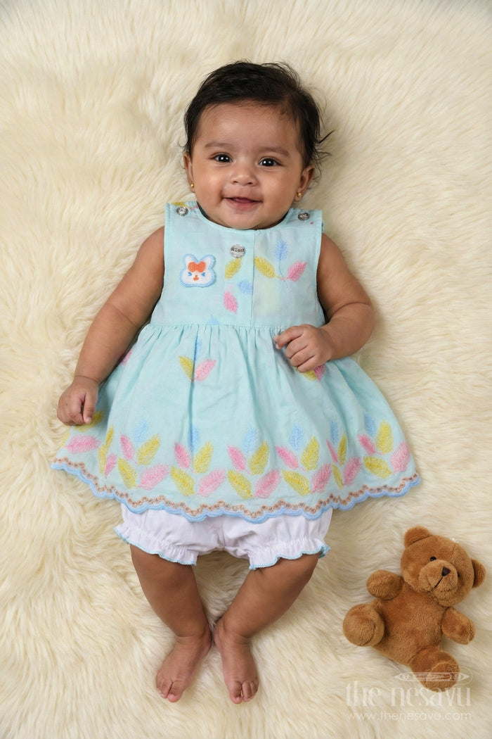 The Nesavu Baby Cotton Frocks Embroidered Baby Frock and Bloomer Set with Playful Leaf Detailing Nesavu Baby frock and bloomer set with multicolor leaf embroidery and character motif