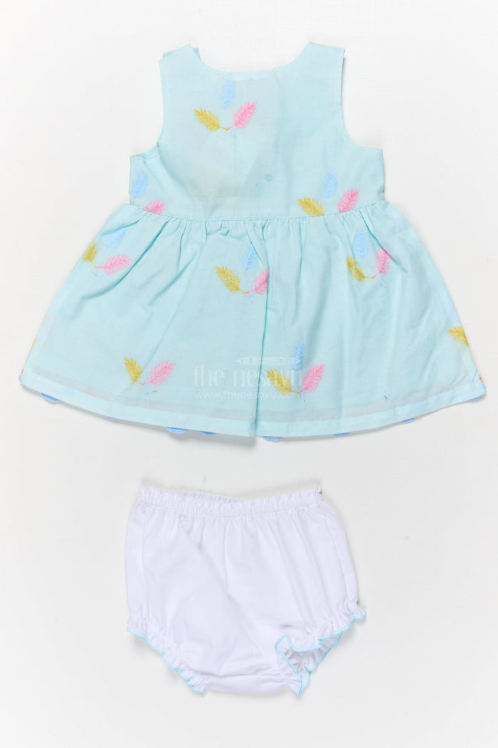 The Nesavu Baby Cotton Frocks Embroidered Baby Frock and Bloomer Set with Playful Leaf Detailing Nesavu Baby frock and bloomer set with multicolor leaf embroidery and character motif