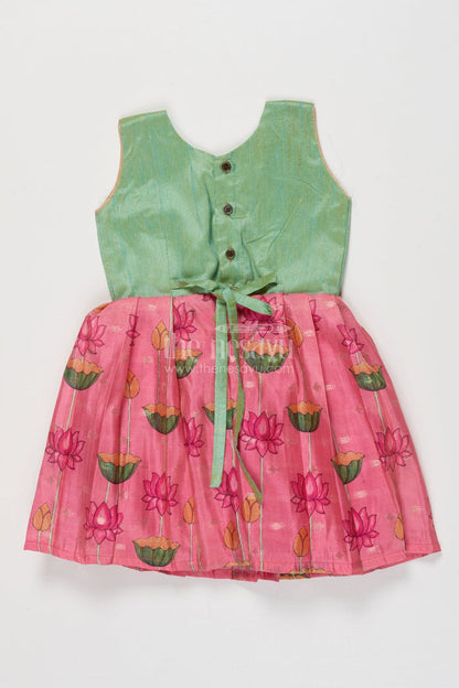 The Nesavu Silk Frock Ethnic Silk Frock for Baby Girl for Festive Wear and Birthday Dressing Nesavu Nesavu baby girl ethnic silk frock with floral lotus print and raw silk yoke for birthdays and poojas