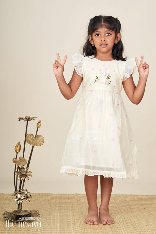 The Nesavu Girls Chanderi Frock Girls Animal Print Ruffle Dress in Chanderi with Thread Embroidery and Pink Floral Accents Nesavu 16 (1Y) / Cream GFC1669A-16 Girls Animal Print Ruffle Dress Chanderi Bunny Motif Floral Embroidery | The Nesavu