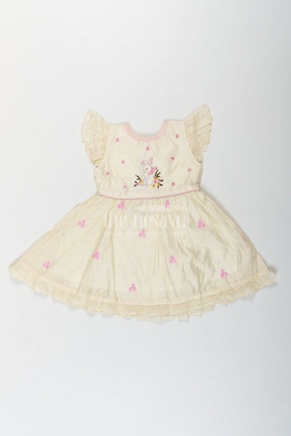 The Nesavu Girls Chanderi Frock Girls Animal Print Ruffle Dress in Chanderi with Thread Embroidery and Pink Floral Accents Nesavu Girls Animal Print Ruffle Dress Chanderi Bunny Motif Floral Embroidery | The Nesavu