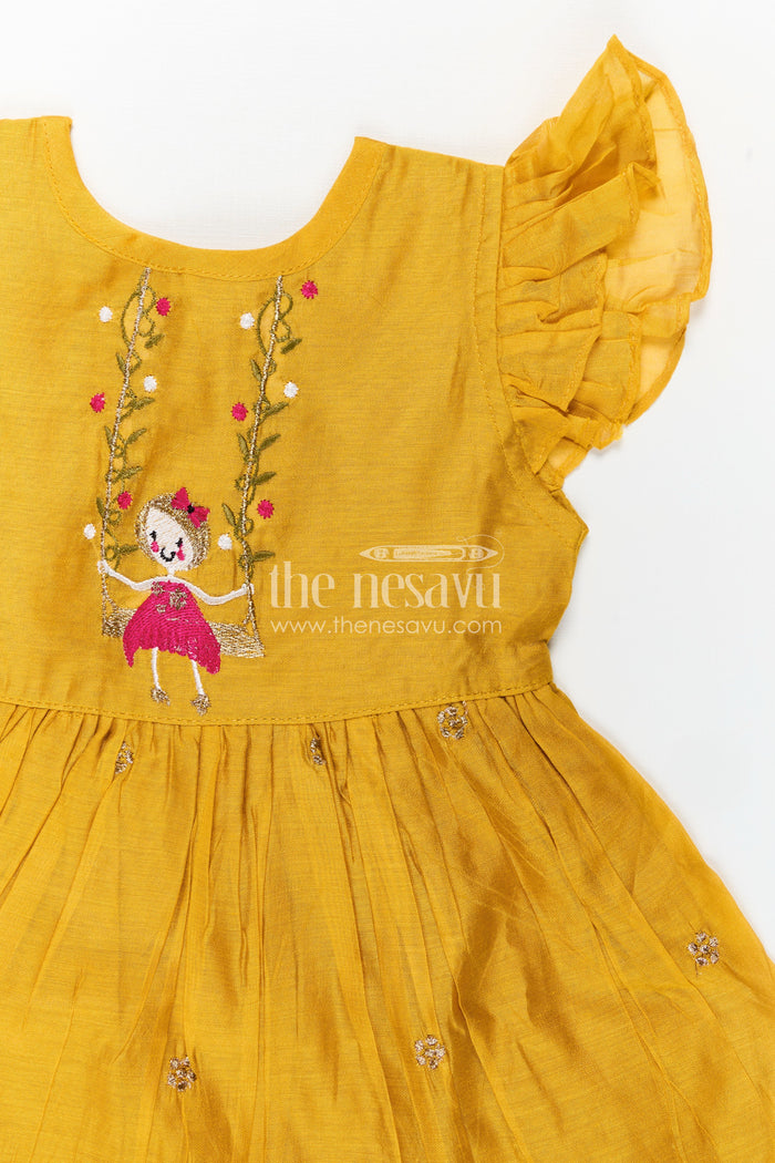 The Nesavu Girls Chanderi Frock Girls Chanderi Cotton Simple Frock Design with Swing Embroidery and Frill Sleeves in Honey Yellow Nesavu Nesavu Girls Chanderi Cotton Honey Yellow Frock Swing Motif Simple Frill Sleeve Design