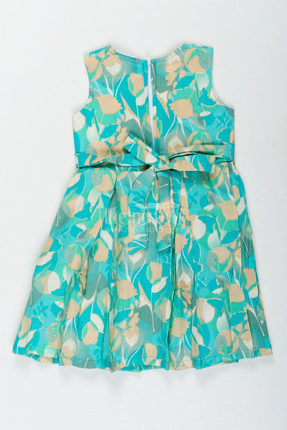 The Nesavu Girls Cotton Frock Girls cotton frock with floral digital print in sleeveless design Nesavu Nesavu girls sleeveless cotton frock with pastel floral digital print and bow detail