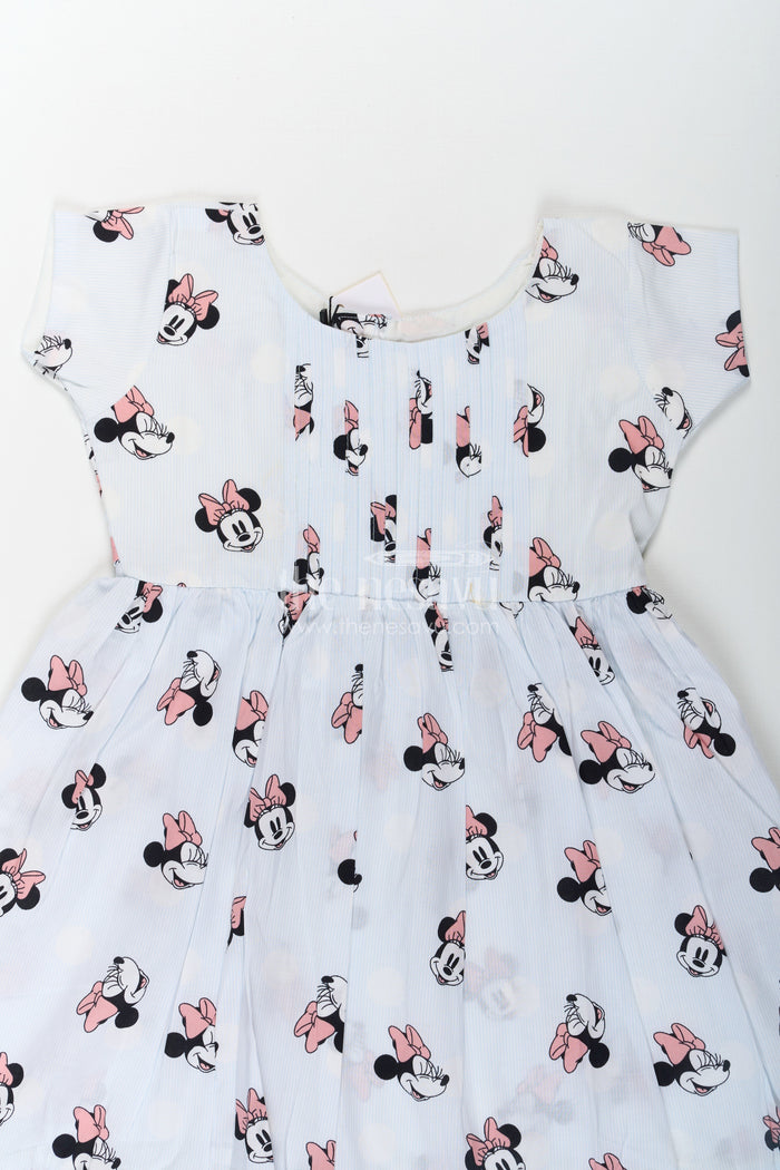 The Nesavu Girls Cotton Frock Girls Cotton White Frock for Eid with Minnie Mouse Digital Print and Ruffled Hem for a Festive Fun Look Nesavu Nesavu Girls White Frock Eid Soft Cotton Minnie Mouse Digital Print Frill Hem Design
