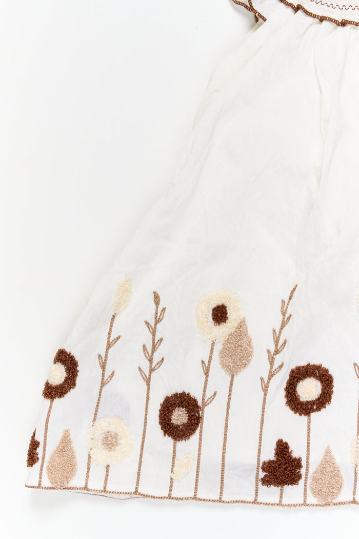 The Nesavu Girls Chanderi Frock Girls Embroidered Frock for Naming Ceremony and Milestone Events Nesavu Nesavu half-white embroidered frock in viscose blend for naming ceremony and traditional functions