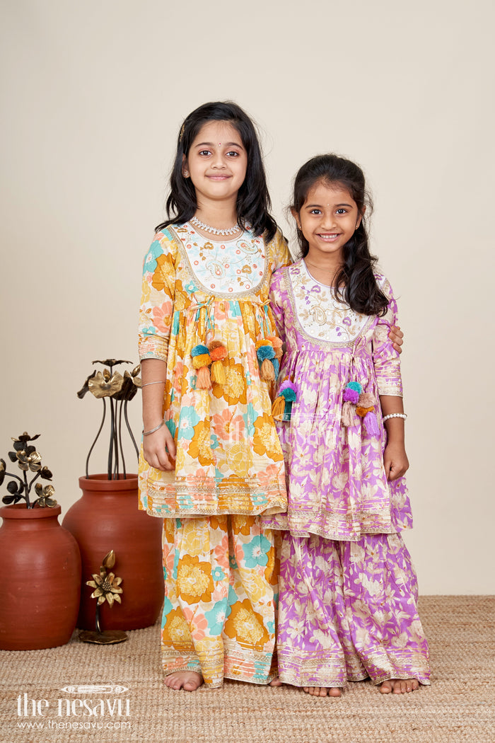 The Nesavu Girls Sharara / Plazo Set Girls floral sharara set with embellished neckline and gota lace Nesavu Nesavu girls floral cotton sharara set embellished neckline tassels  festive wear Navratri