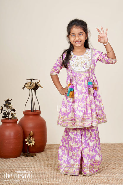 The Nesavu Girls Sharara / Plazo Set Girls floral sharara set with embellished neckline and gota lace Nesavu Nesavu girls floral cotton sharara set embellished neckline tassels  festive wear Navratri