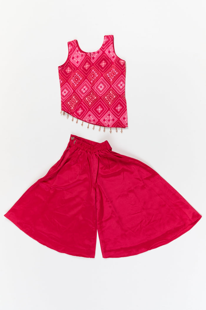 The Nesavu Girls Sharara / Plazo Set Girls Plazo Set with Sequin Embroidery for Festive Gatherings Nesavu Nesavu girls plazo set with sequin embroidered yoke and tassels – perfect for festive events and family gatherings