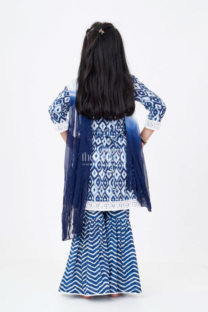 The Nesavu Girls Sharara / Plazo Set Girls Suit Plazo Set with Ikat Inspired Print and Pom-Pom Detailing in Blue and White Nesavu Nesavu Girls Blue White Suit Plazo Set Ikat Inspired Print Pom-Pom Detailing