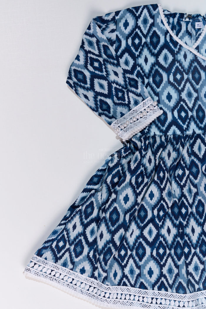 The Nesavu Girls Sharara / Plazo Set Girls Suit Plazo Set with Ikat Inspired Print and Pom-Pom Detailing in Blue and White Nesavu Nesavu Girls Blue White Suit Plazo Set Ikat Inspired Print Pom-Pom Detailing