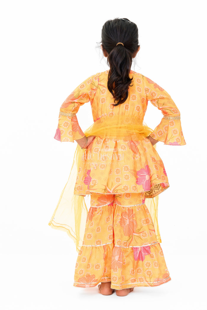 The Nesavu Girls Sharara / Plazo Set Girls Yellow Chinon Silk Sharara Set with Floral Print and Flared Sleeves for Festive Celebrations Nesavu Nesavu Girls Yellow Chinon Silk Sharara Set Flared Sleeves Floral Print Festive Occasions