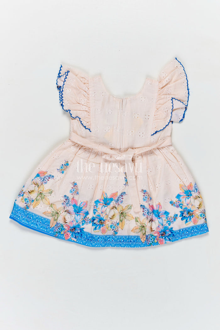 The Nesavu Baby Cotton Frocks Infant Occasion Dress for Baby Girl in Cream Hakoba Cotton with Blue Floral Hem and Ruffled Sleeves Nesavu Nesavu Infant Occasion Cotton Frock Baby Girl Blue Floral Print Ruffle Sleeves Hakoba Fabric