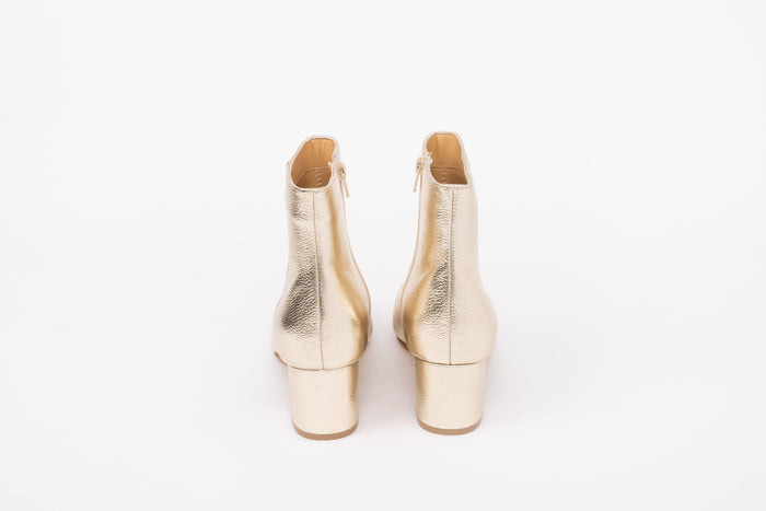 Back view of Izzy boot in Gold. Heeled womens party boot in larger sizes 8-12
